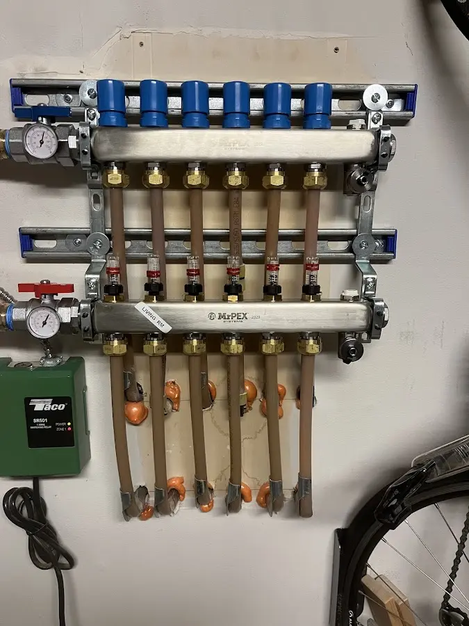 Plumber performing Gas Leak Detection at a residential property in Huntington